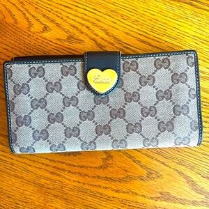 GUCCI GG Crystal Canvas & Leather.